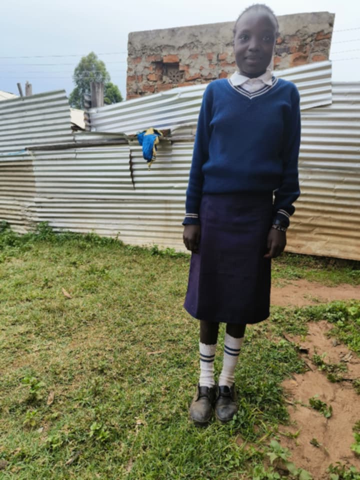 Rose Nasimiyu 13 years old